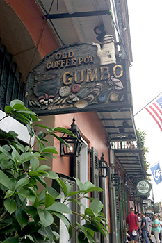 A restaurant sign for a gumbo restaurant