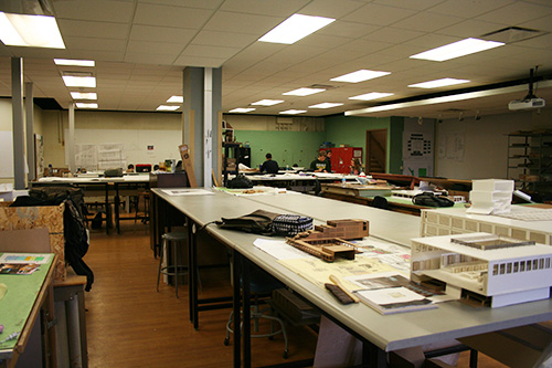 Students working in a model building lab