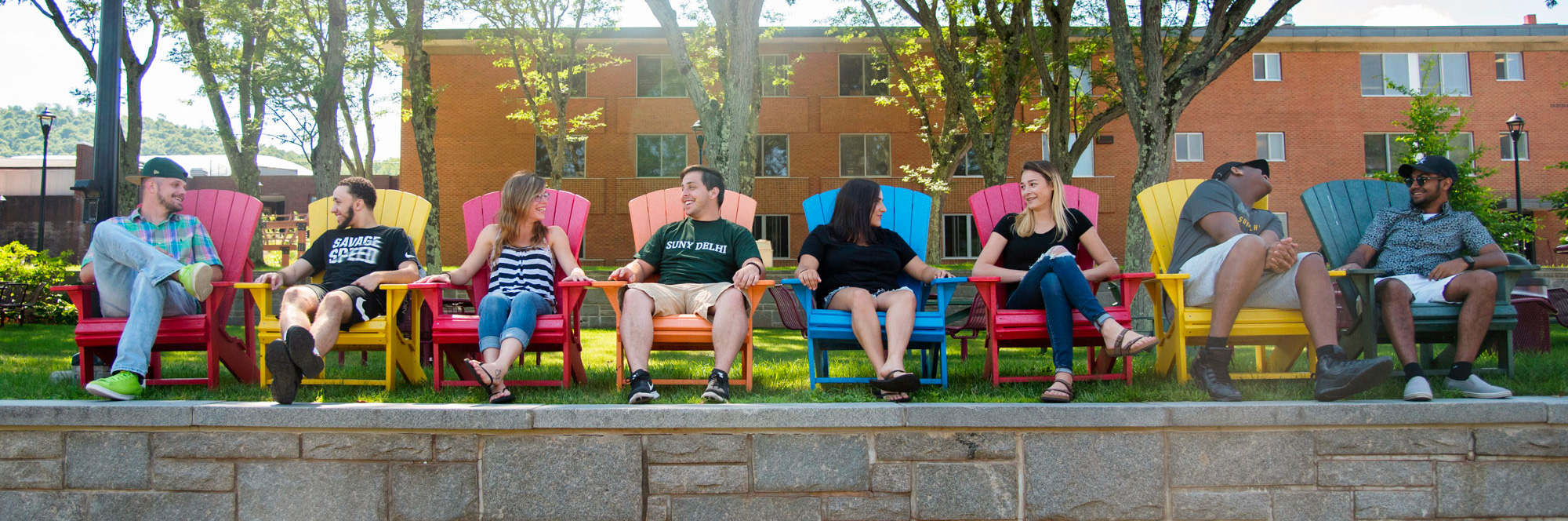 College students sitting in chairs