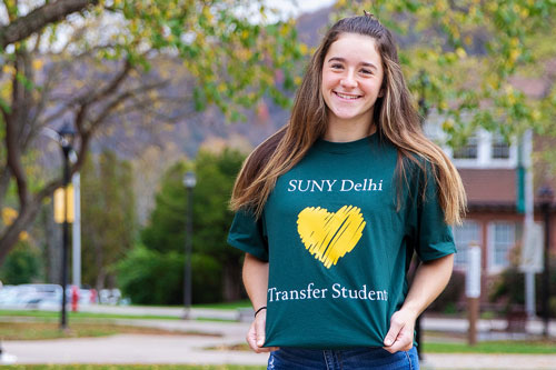 Transfer Student showing off shirt