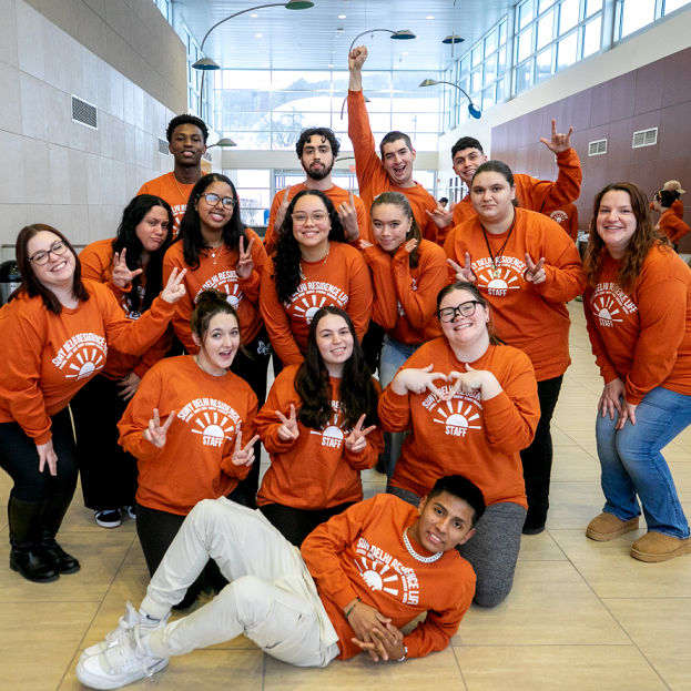 RAs in orange tshirts